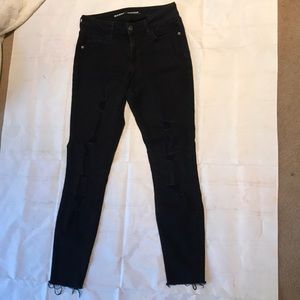 Distressed black denim